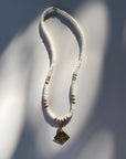 Flower Pendant + Organic White Puka Shell necklace