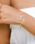 Michelle Dainty Puka + Pearl bracelet